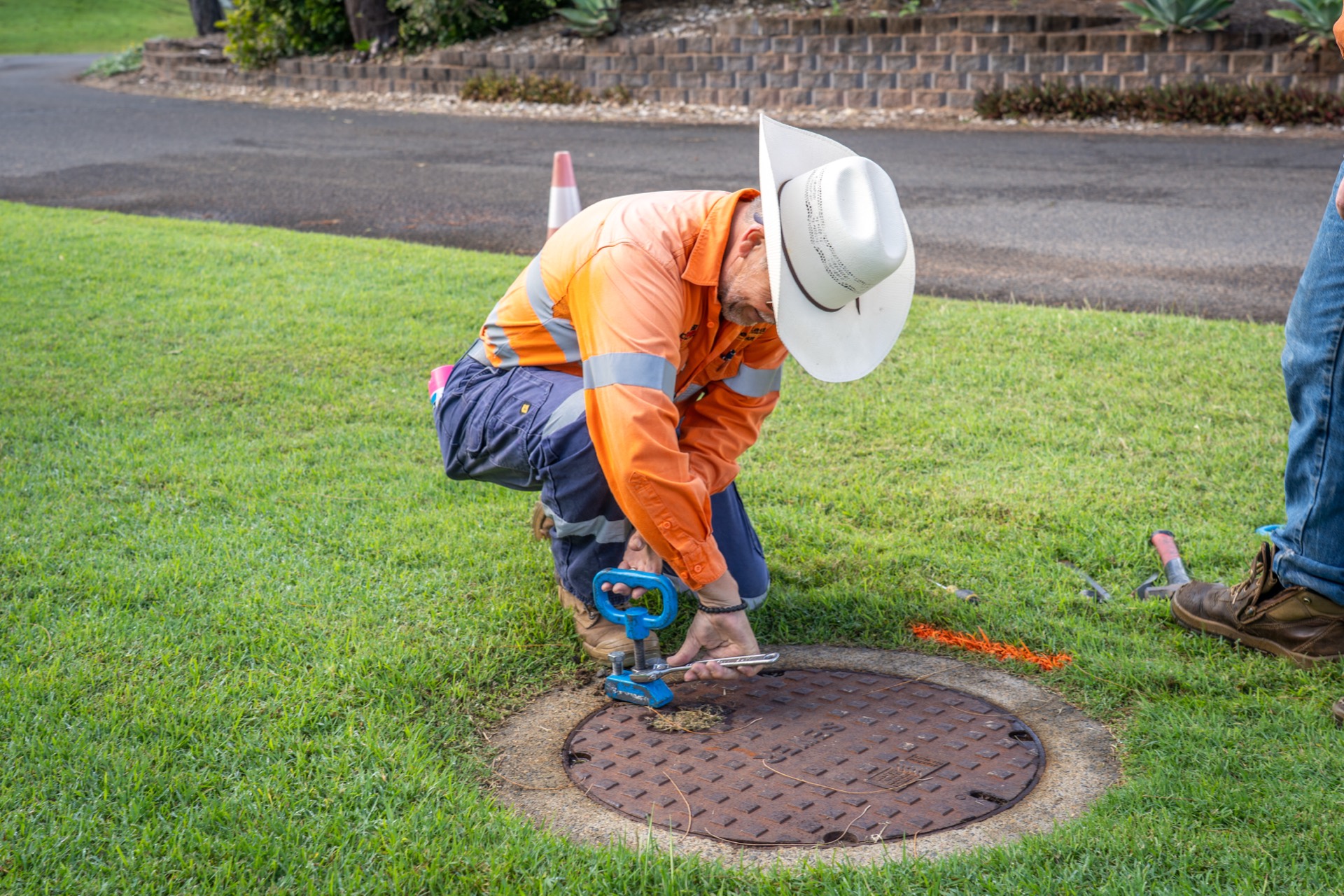 GeoRadar locators opening an access pit on a residential verge